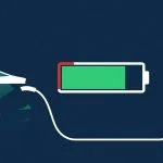 Electric car plugged into a home charger with dashboard showing charge stopping at 80 percent